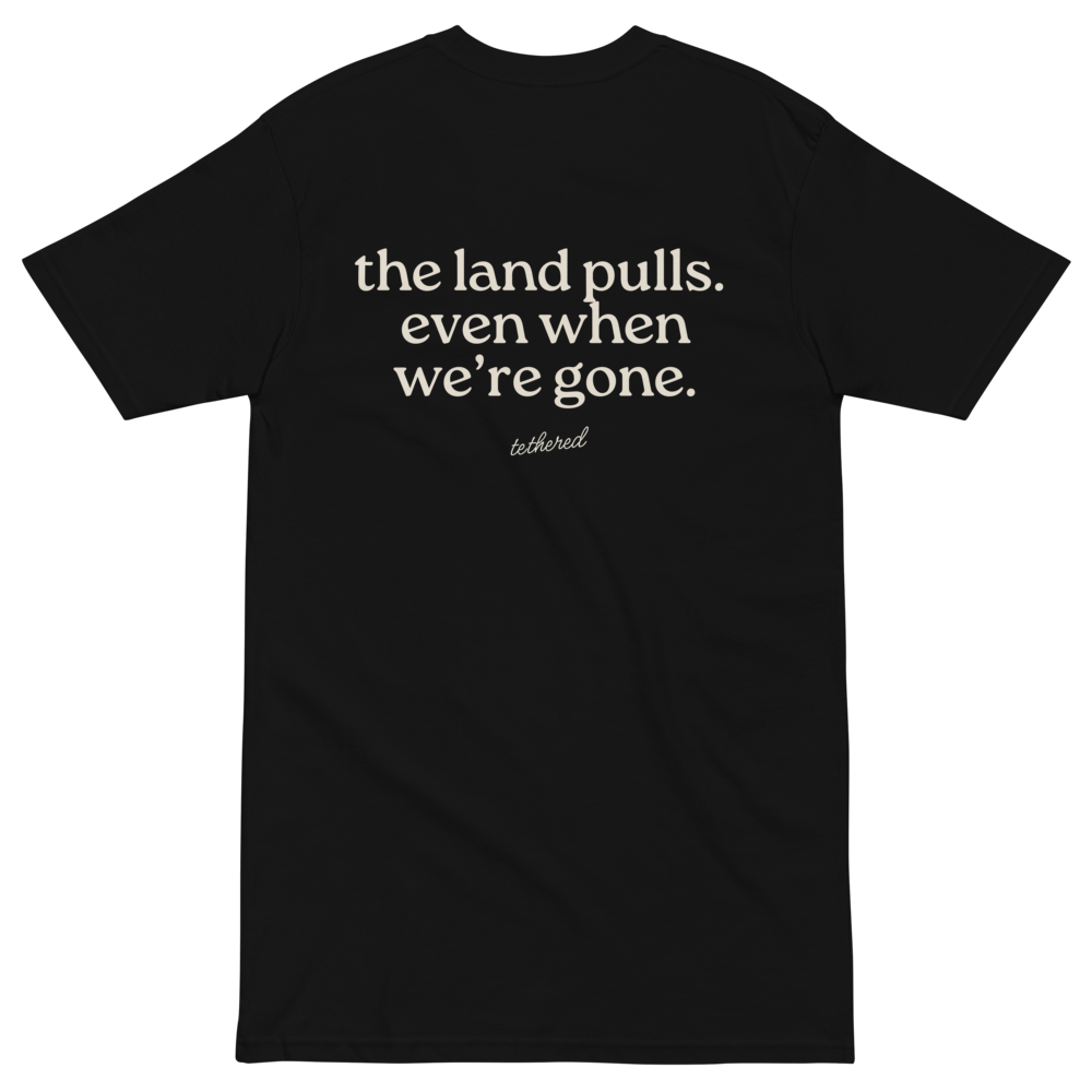 black the land pulls tee unfolded with strong heritage-inspired print