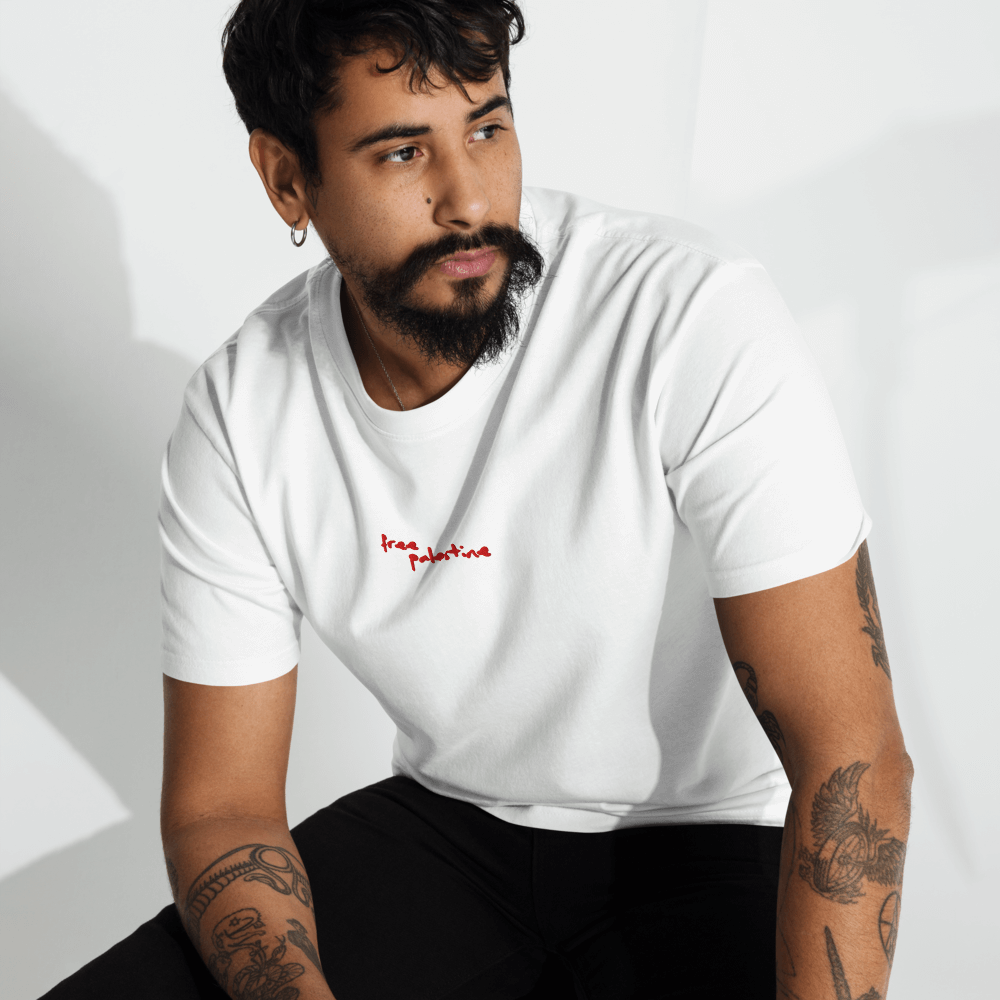 model wearing black free palestine tee outdoors