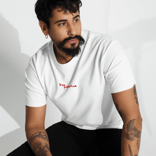 model wearing black free palestine tee outdoors