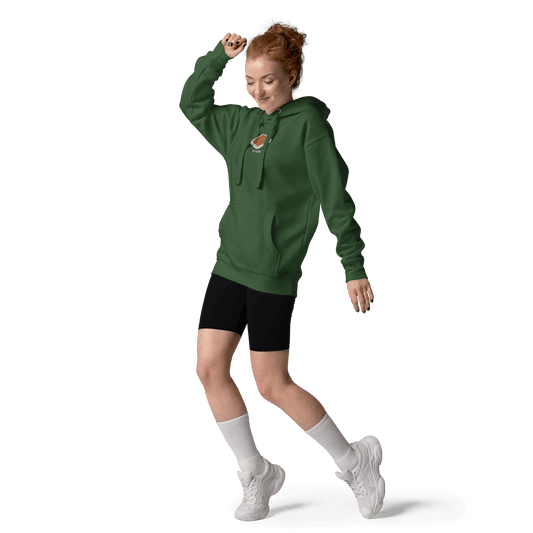 model wearing forest green knafeh hoodie outdoors